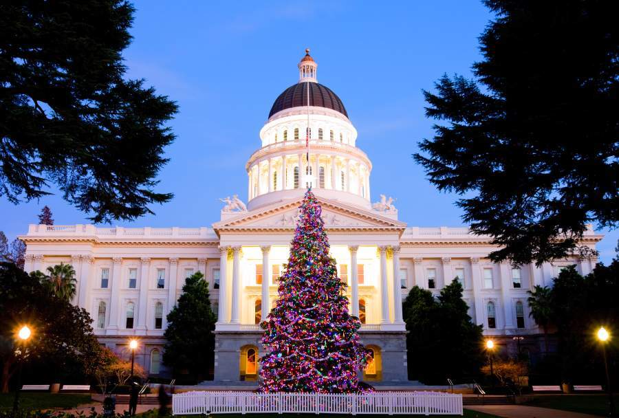 Christmas tree lit up in front of Sacramento Capitol